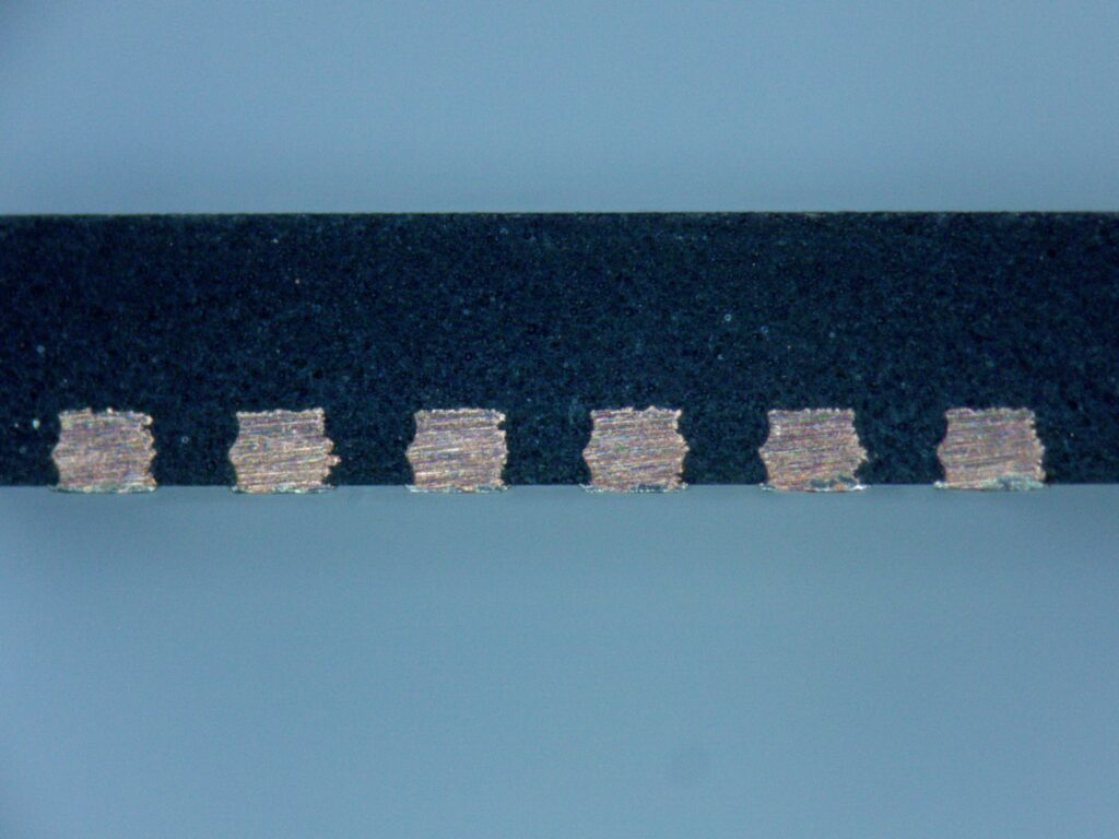 Supplied microscope image. A visual check does not establish complete electrical performance.